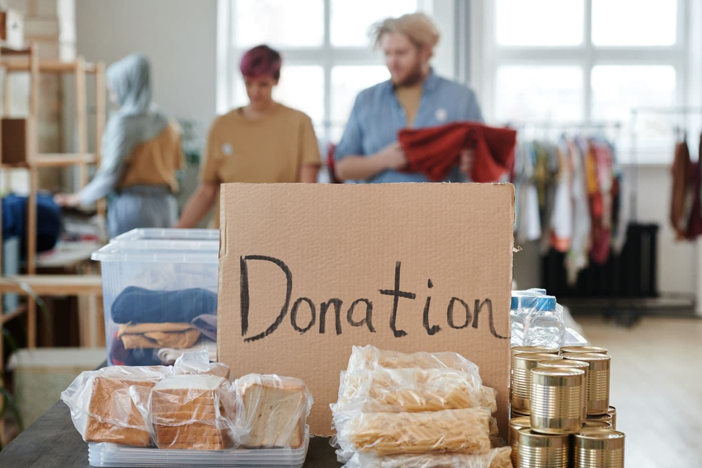 Volunteers running a community donation drive